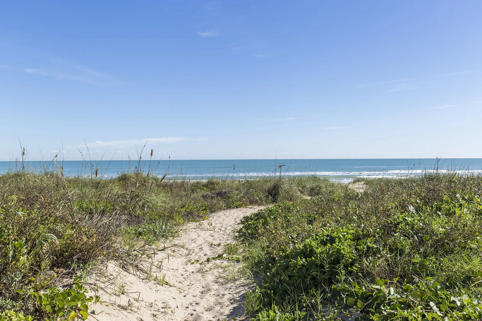 Private beach walkway leading from Continental Condominiums to the sand on South Padre Island.