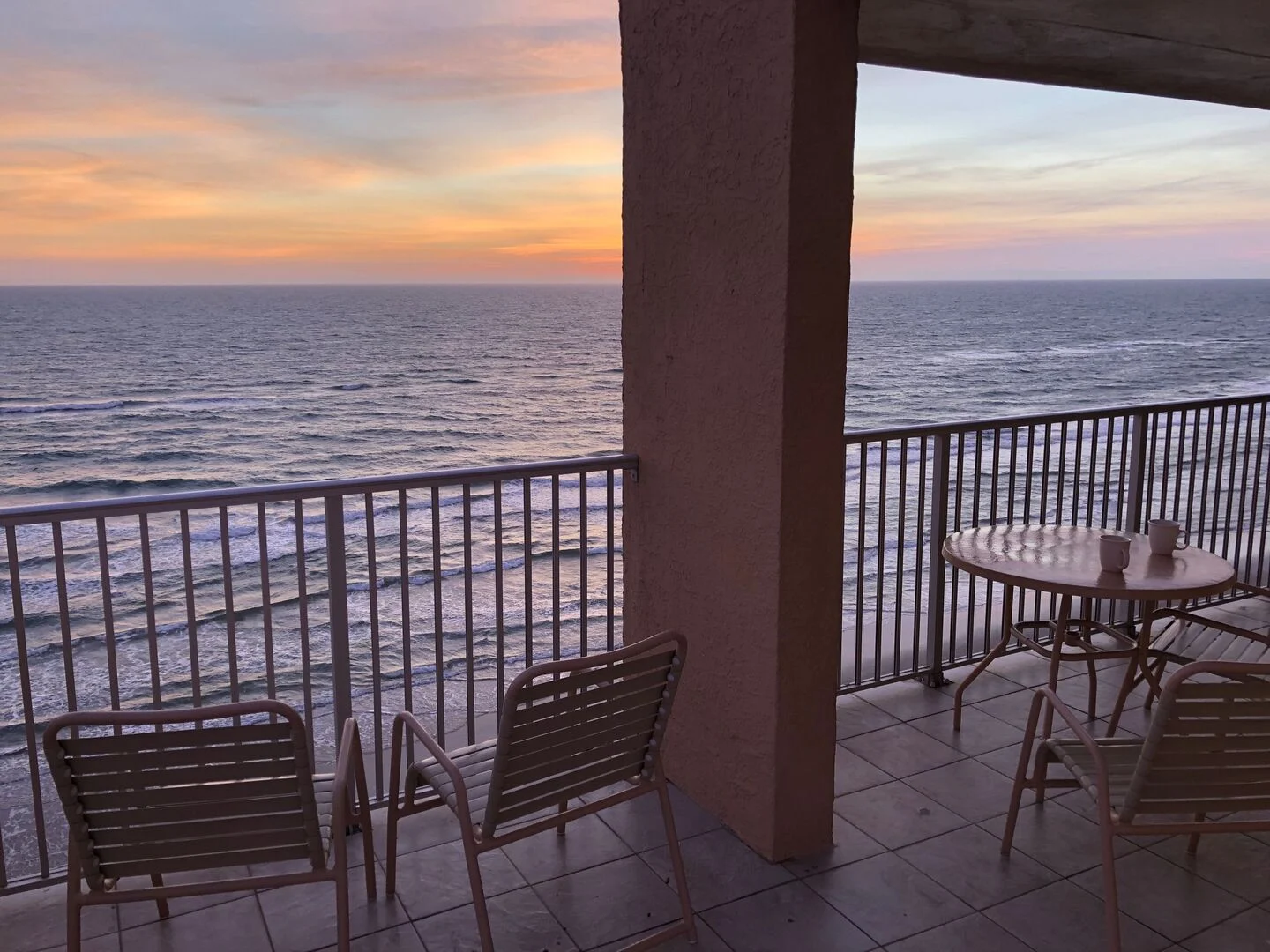 View from an Inverness Condominiums balcony looking down the South Padre Island beach.